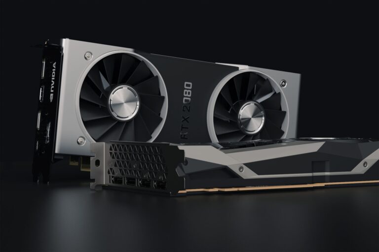 Intel’s Arc GPU Push Is Finally Threatening NVIDIA’s Budget Stranglehold A modern graphics card displayed on a dark surface highlighting its cooling design