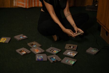 A collection of old video game cartridges representing game preservation efforts