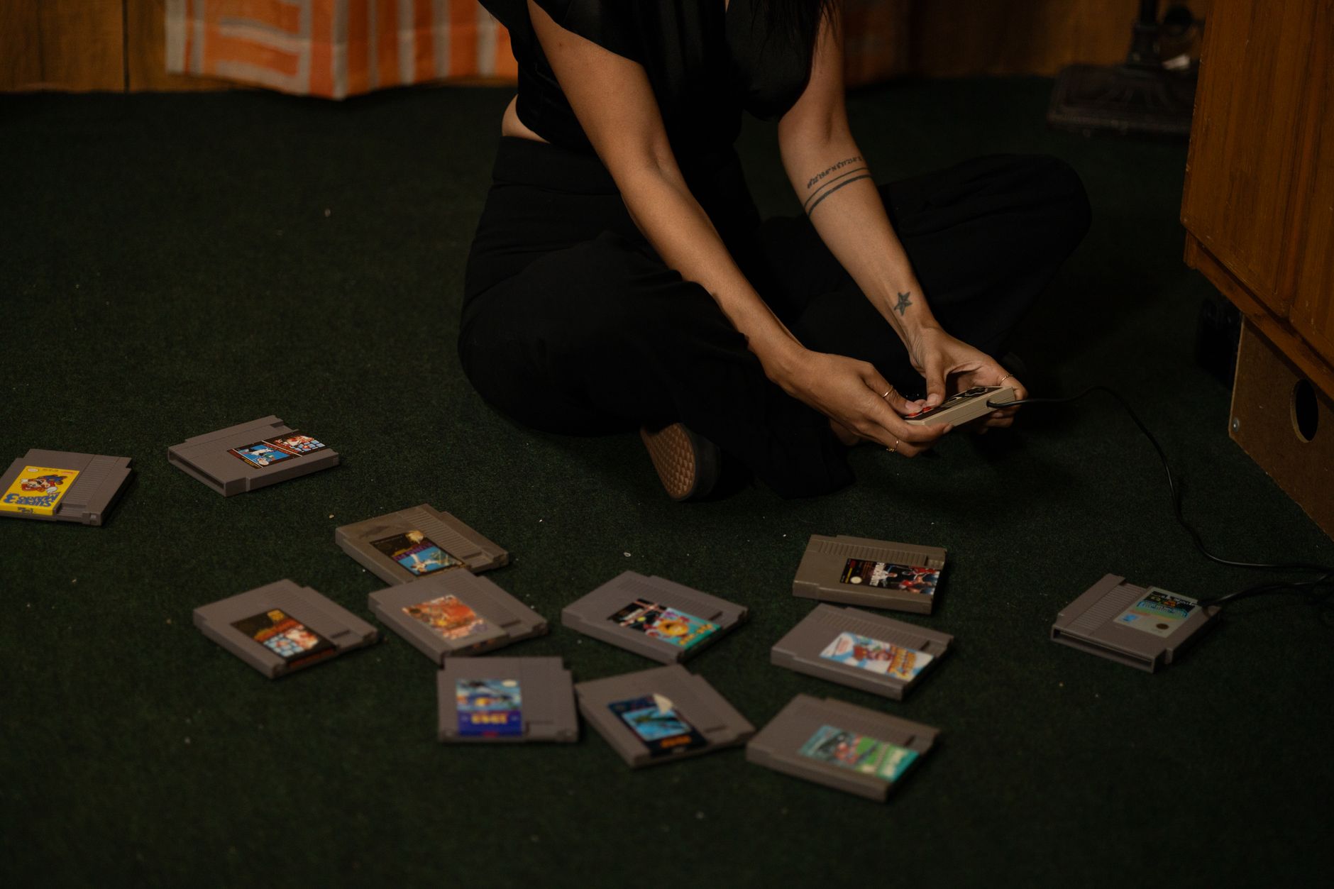 A collection of old video game cartridges representing game preservation efforts