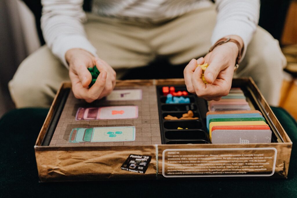 Friends gathered around a board game during a casual game night