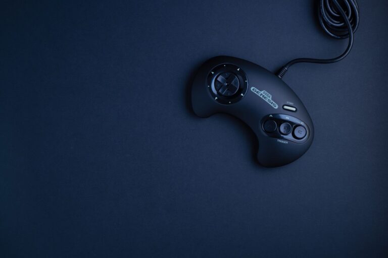 A vintage video game controller resting on a surface, representing classic gaming nostalgia