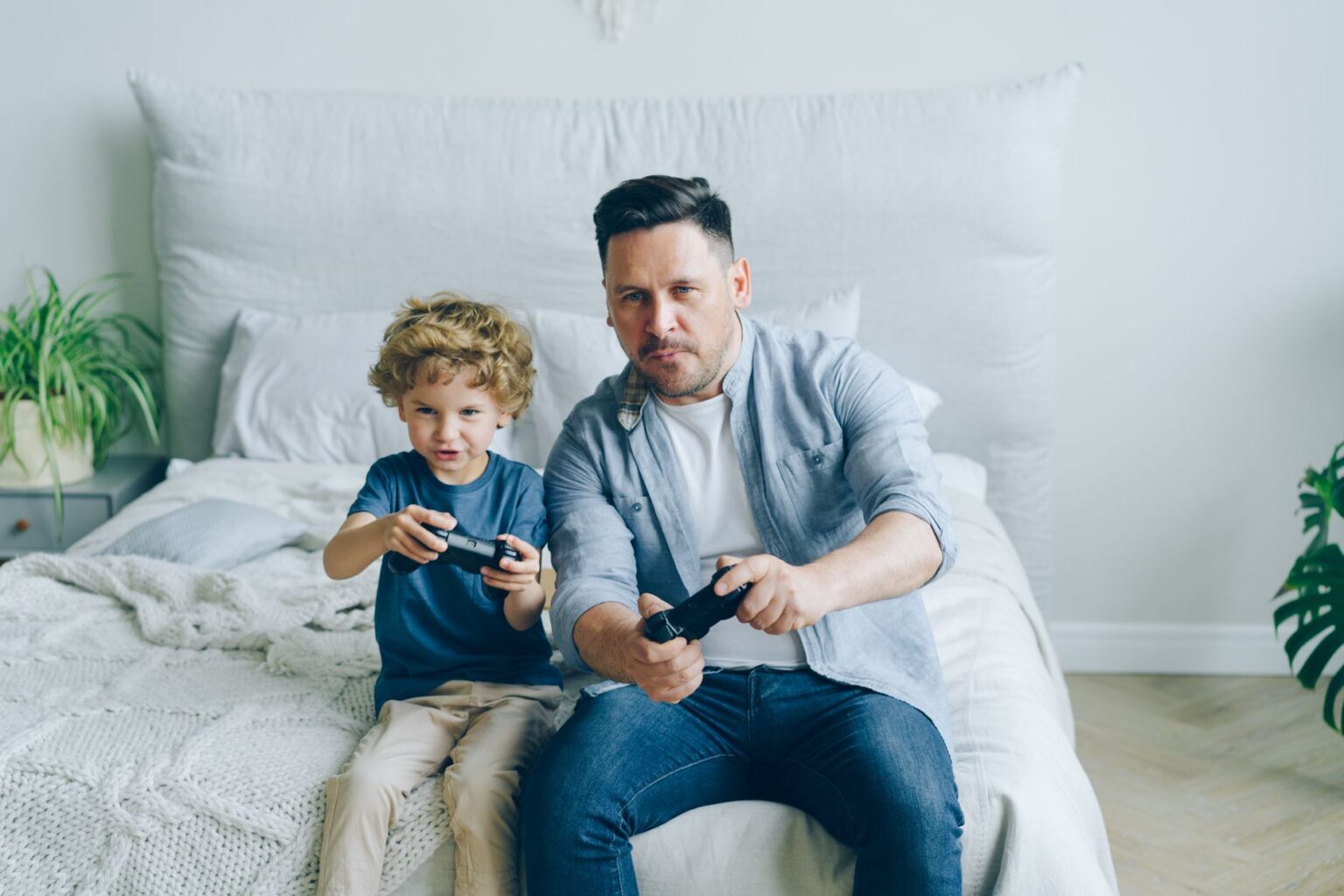 A child playing on a handheld gaming console at home