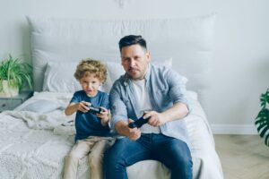 A child playing on a handheld gaming console at home