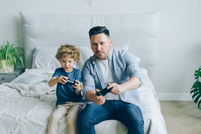 A child playing on a handheld gaming console at home