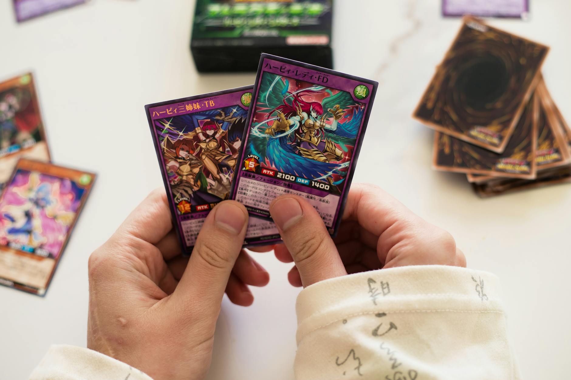 Colorful trading card collection spread out on a table