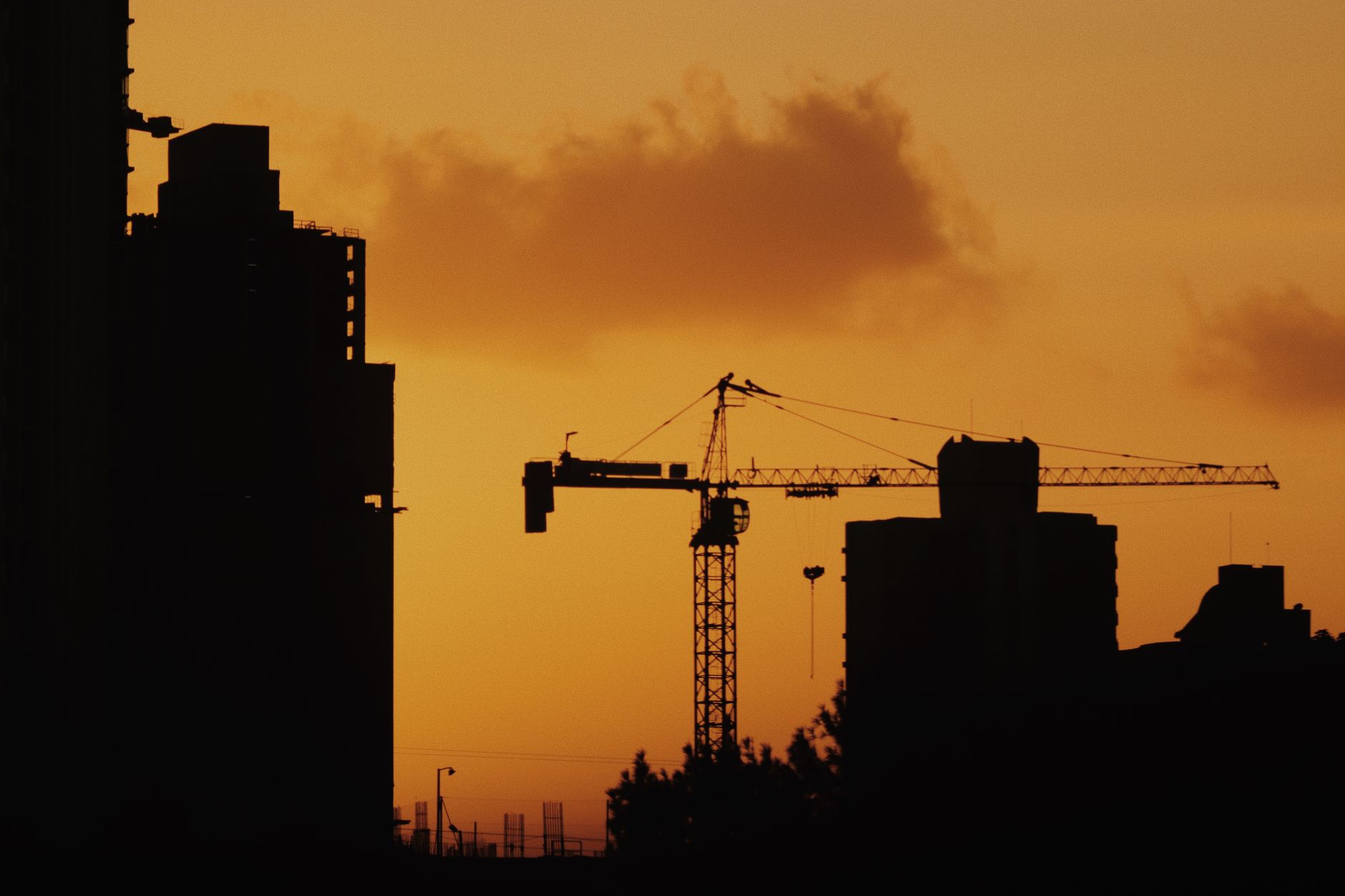 Urban city construction scene with buildings and scaffolding