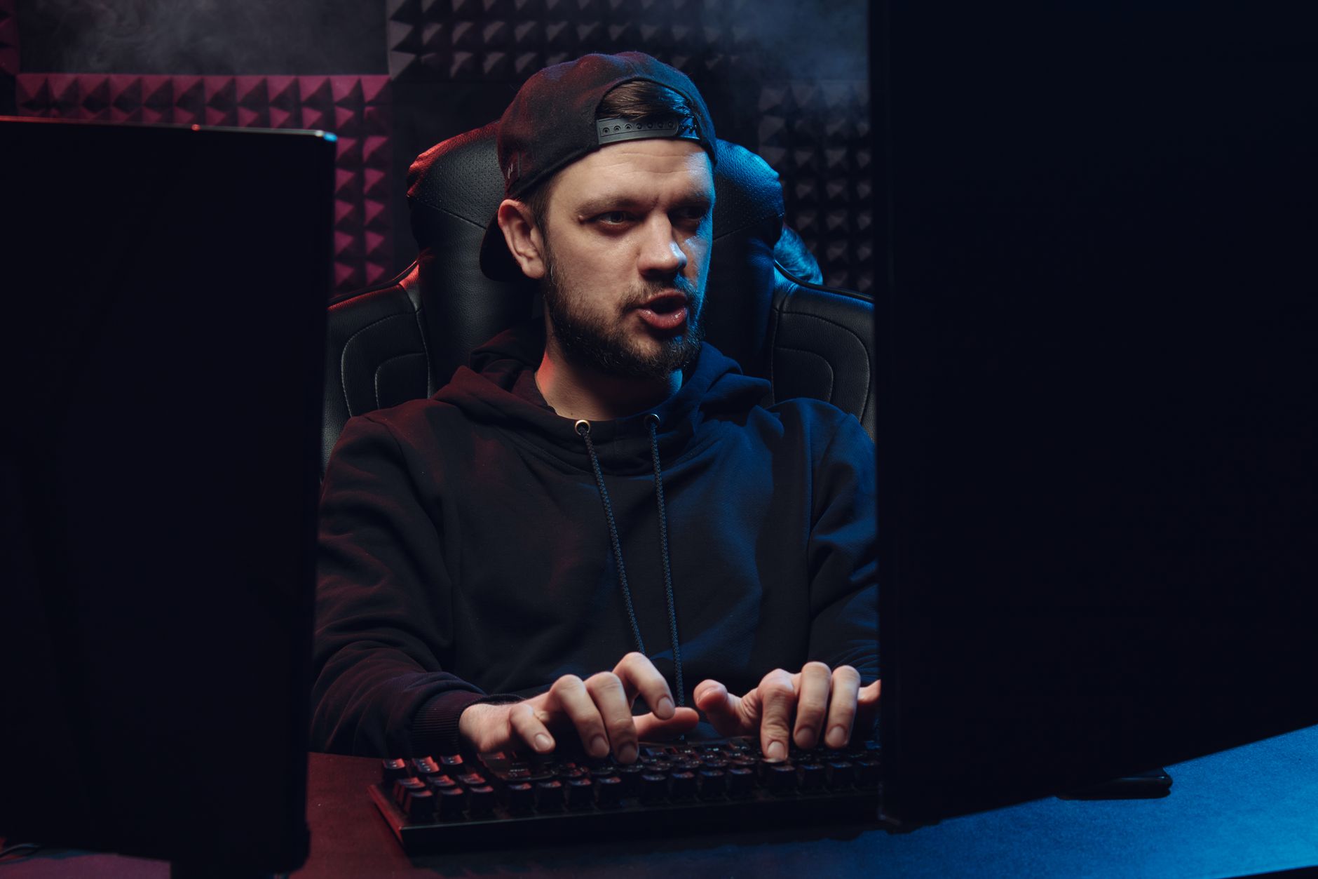 A developer working at a computer screen during game production