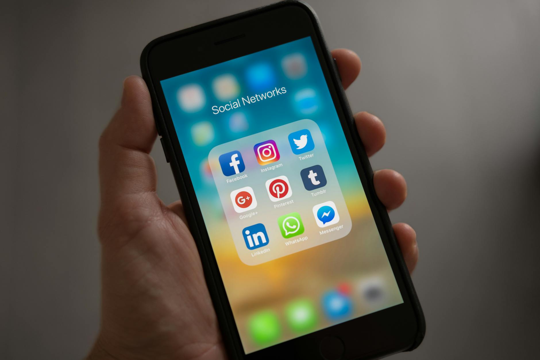 Person scrolling through short-form video content on a smartphone