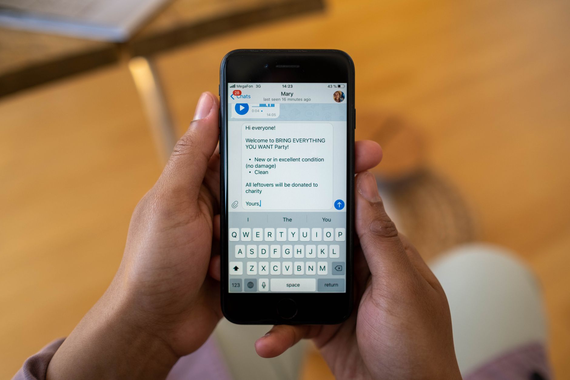 Person looking at a messaging or chat application on a smartphone