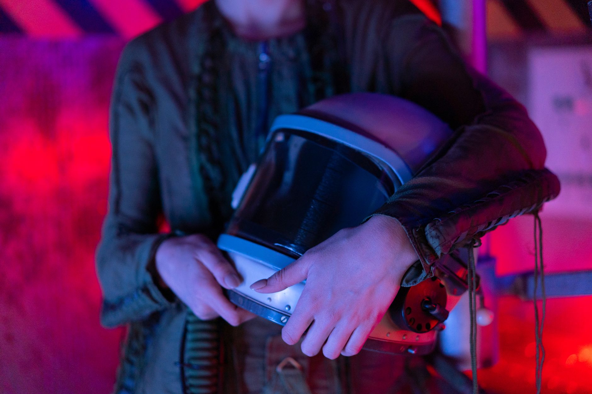 Reflective space helmet visor with dark background suggesting isolation and science fiction