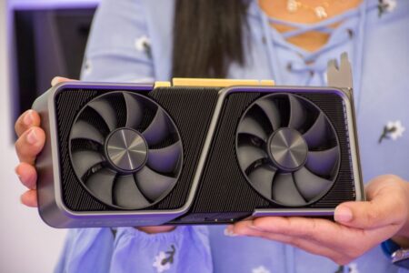 Close-up of a modern graphics card showing cooling fans and PCIe connectors