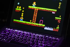 Steam’s Refund Policy Crackdown Is Quietly Frustrating Indie Buyers A gaming laptop on a desk displaying a digital storefront interface