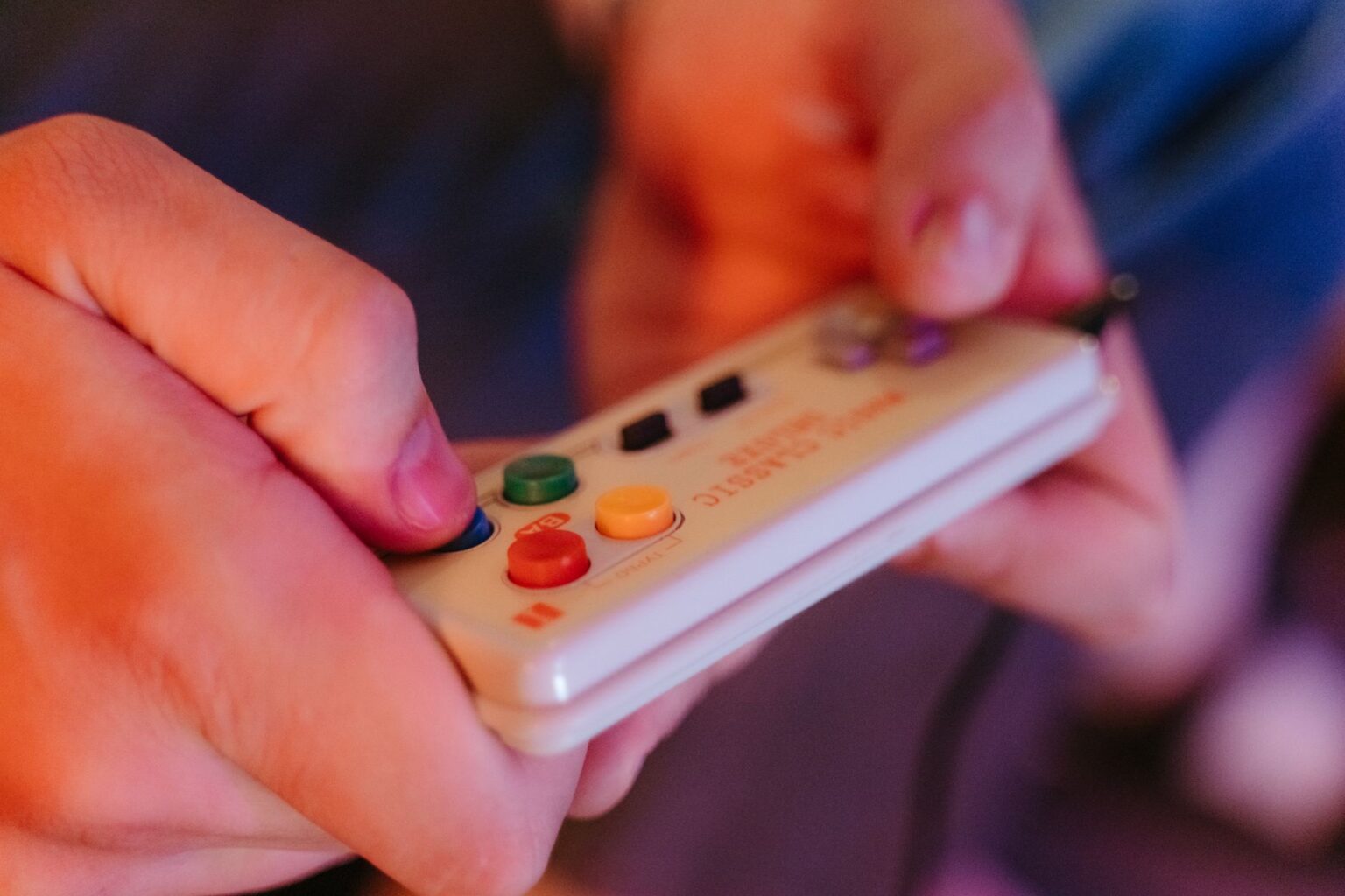 A classic video game controller resting on a surface, representing nostalgia for older console gaming experiences