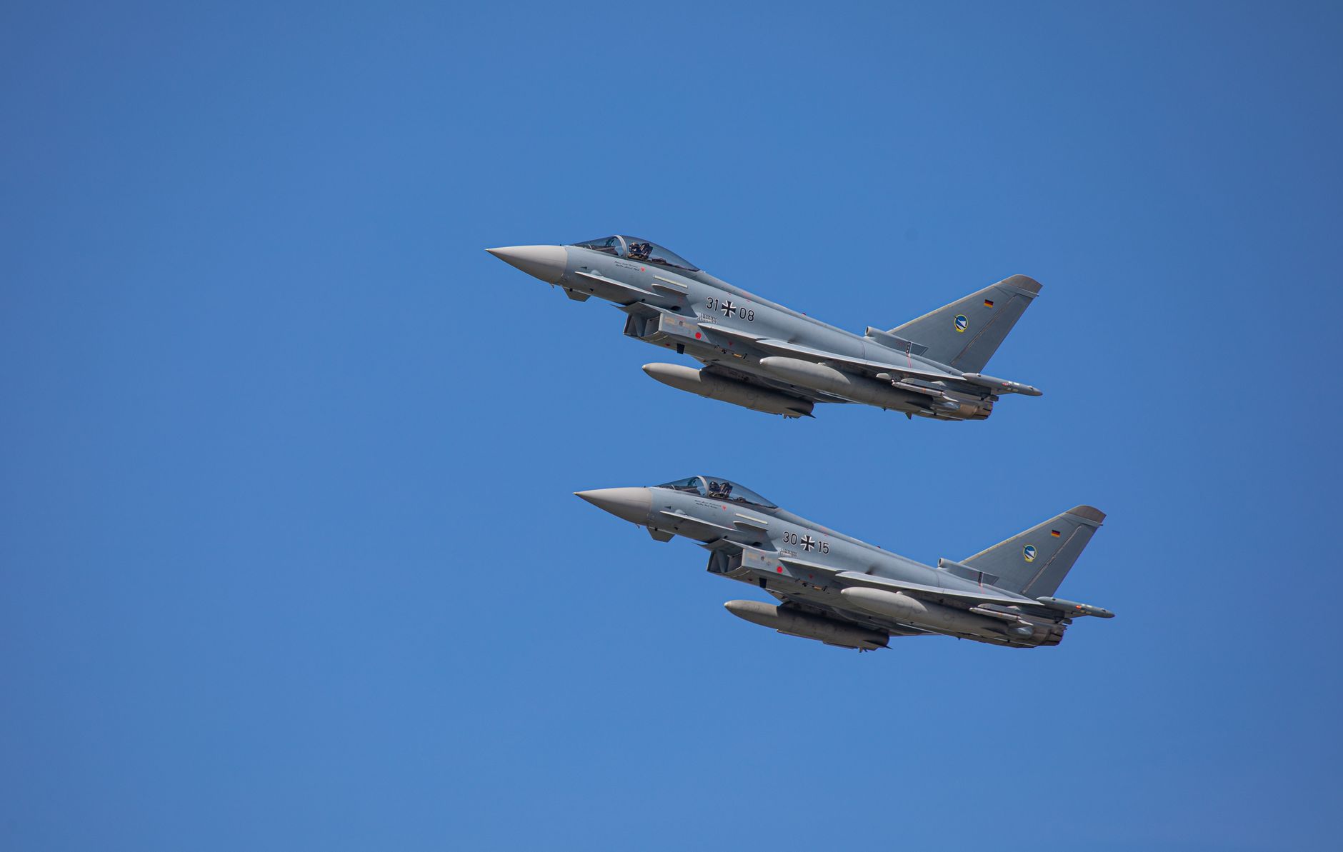 A sleek fighter jet in flight, evoking the aerial combat style of Star Fox games