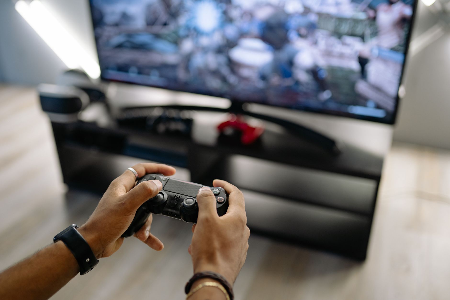 A modern television screen displaying a video game, representing the home console gaming experience