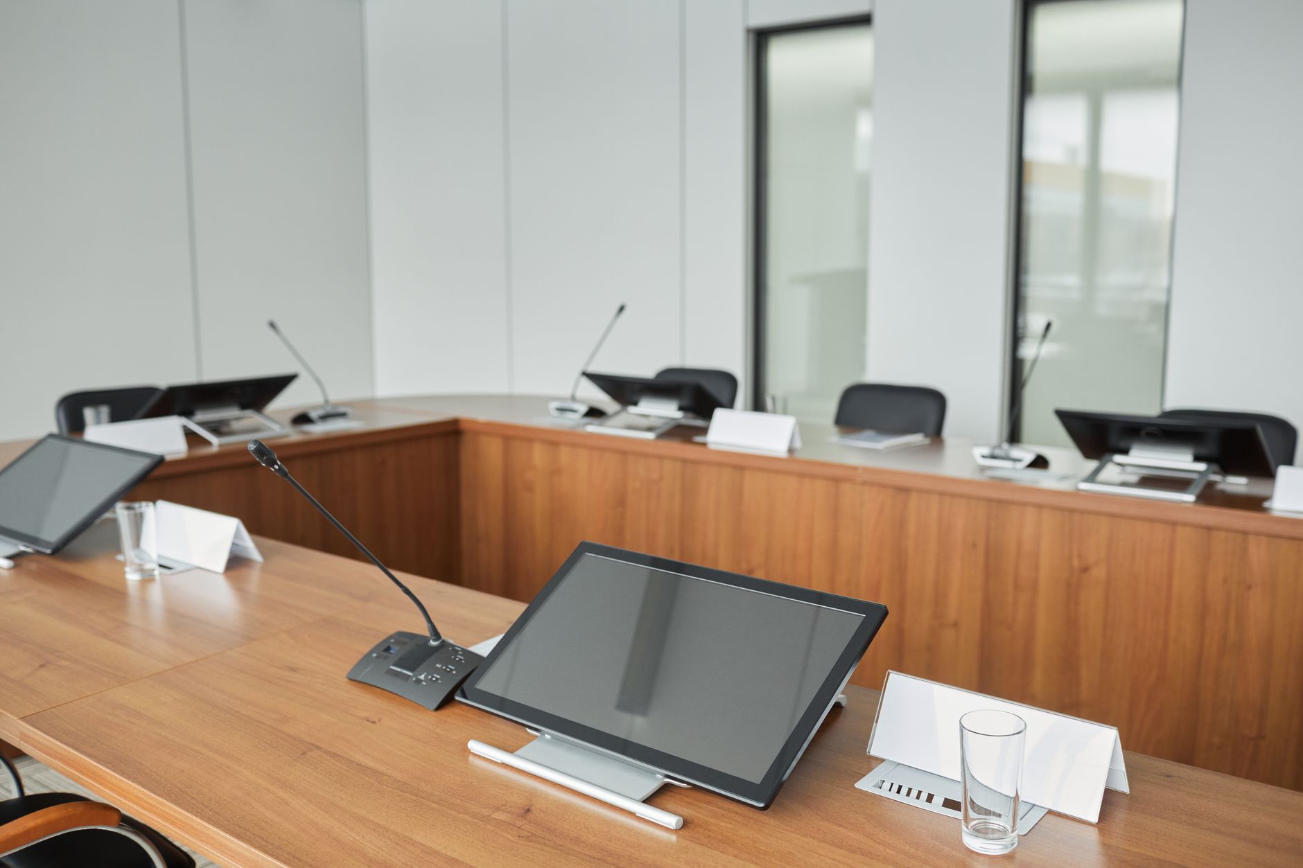 Empty corporate boardroom suggesting leadership transition and strategic planning