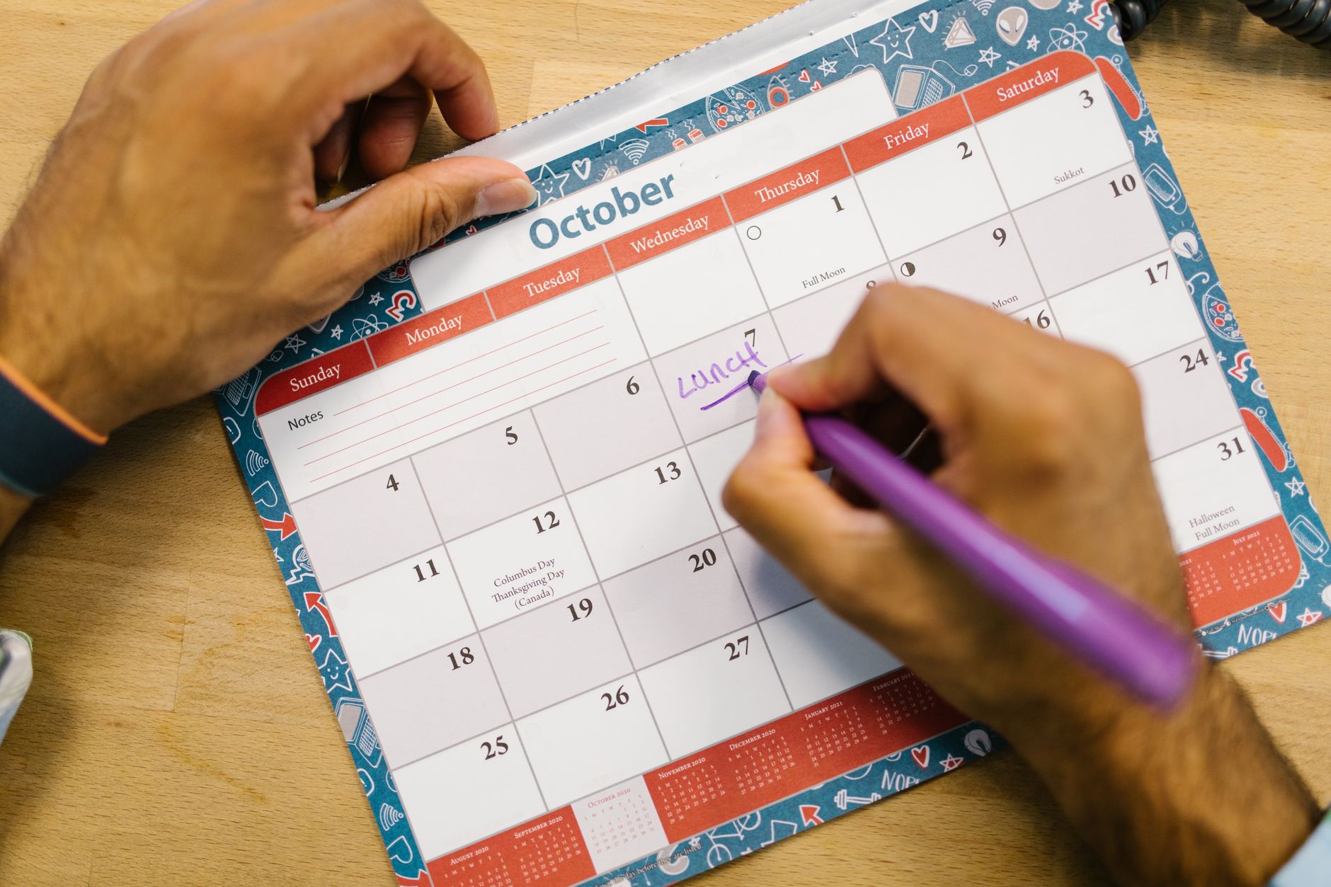 A desk calendar with planning notes representing Nintendo's release schedule decisions