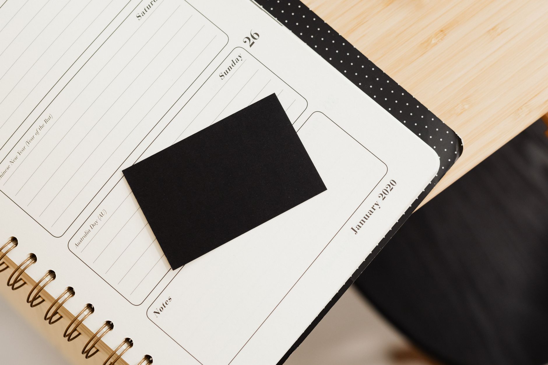 An empty desk calendar open to a blank page, representing a gap in scheduled releases