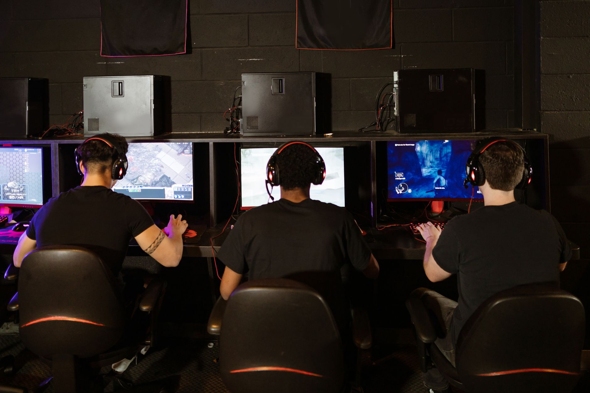 A person sitting in front of a TV screen, waiting, representing fans anticipating a game announcement