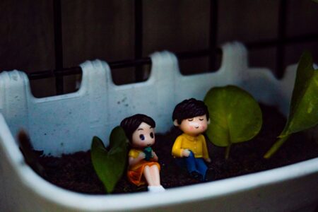 Pikmin 4’s Post-Launch Silence Is Cooling Franchise Momentum Tiny garden scene with small plants and soil, evoking the miniature world of Pikmin