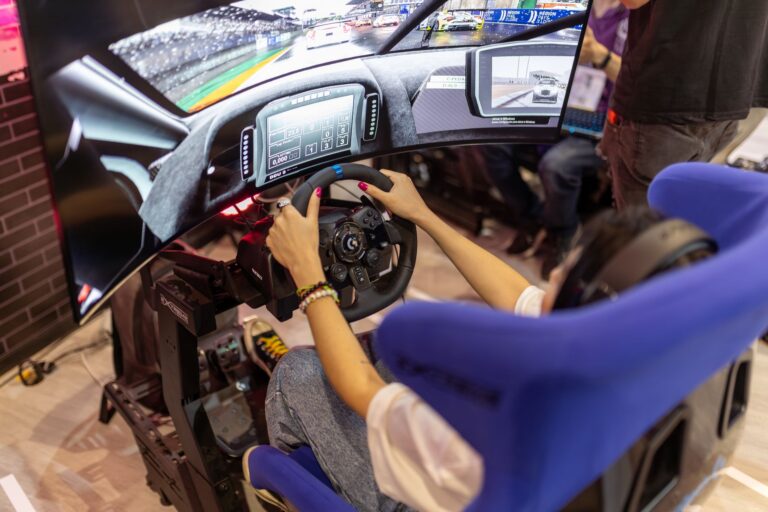 A game controller resting on a surface, representing video game racing mechanics
