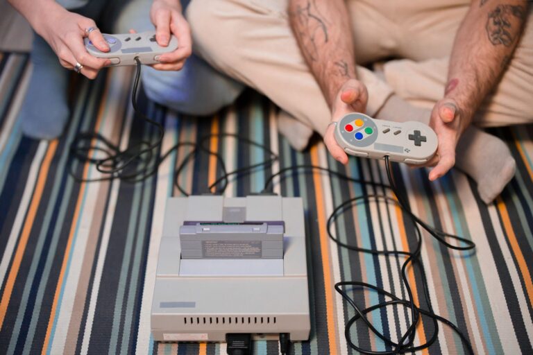A retro gaming console and controller representing classic Nintendo hardware