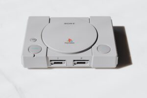Classic retro gaming console sitting on a shelf, evoking nostalgia for 1990s platformer games