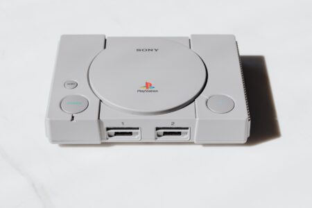 Classic retro gaming console sitting on a shelf, evoking nostalgia for 1990s platformer games