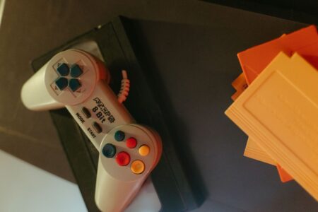 A classic gaming controller resting on a wooden surface, representing retro Nintendo gaming nostalgia