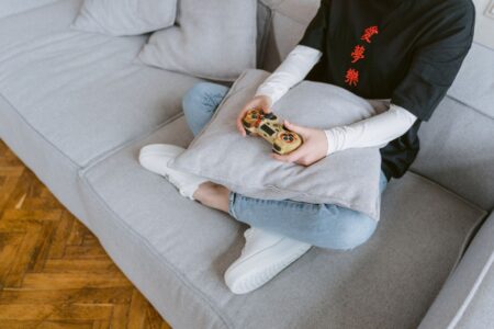 A cozy home gaming setup with a Nintendo console and soft ambient lighting