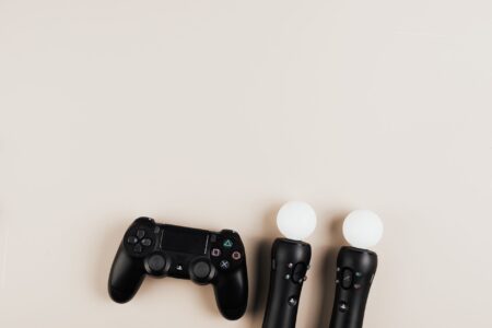 A video game controller resting on a surface, representing gaming frustration and challenge