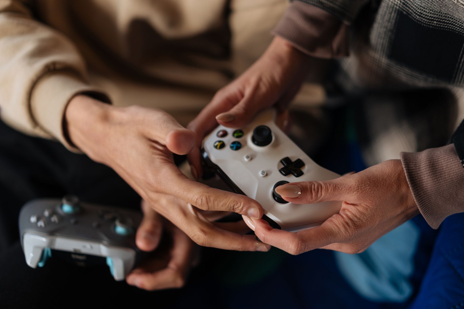 Game controller in close-up representing player engagement with Nintendo hardware