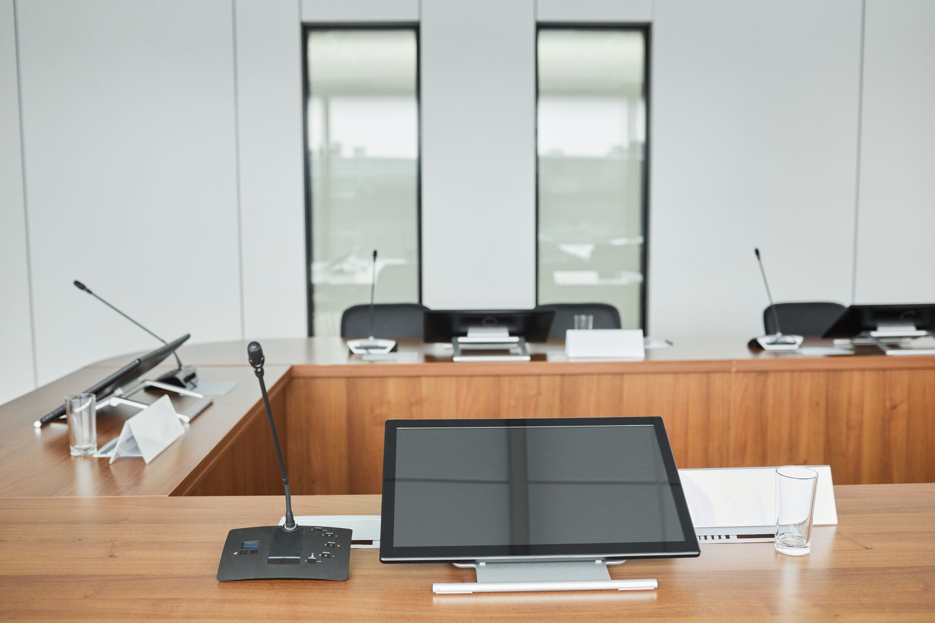 Empty corporate boardroom with large table, representing executive decision-making in the gaming industry