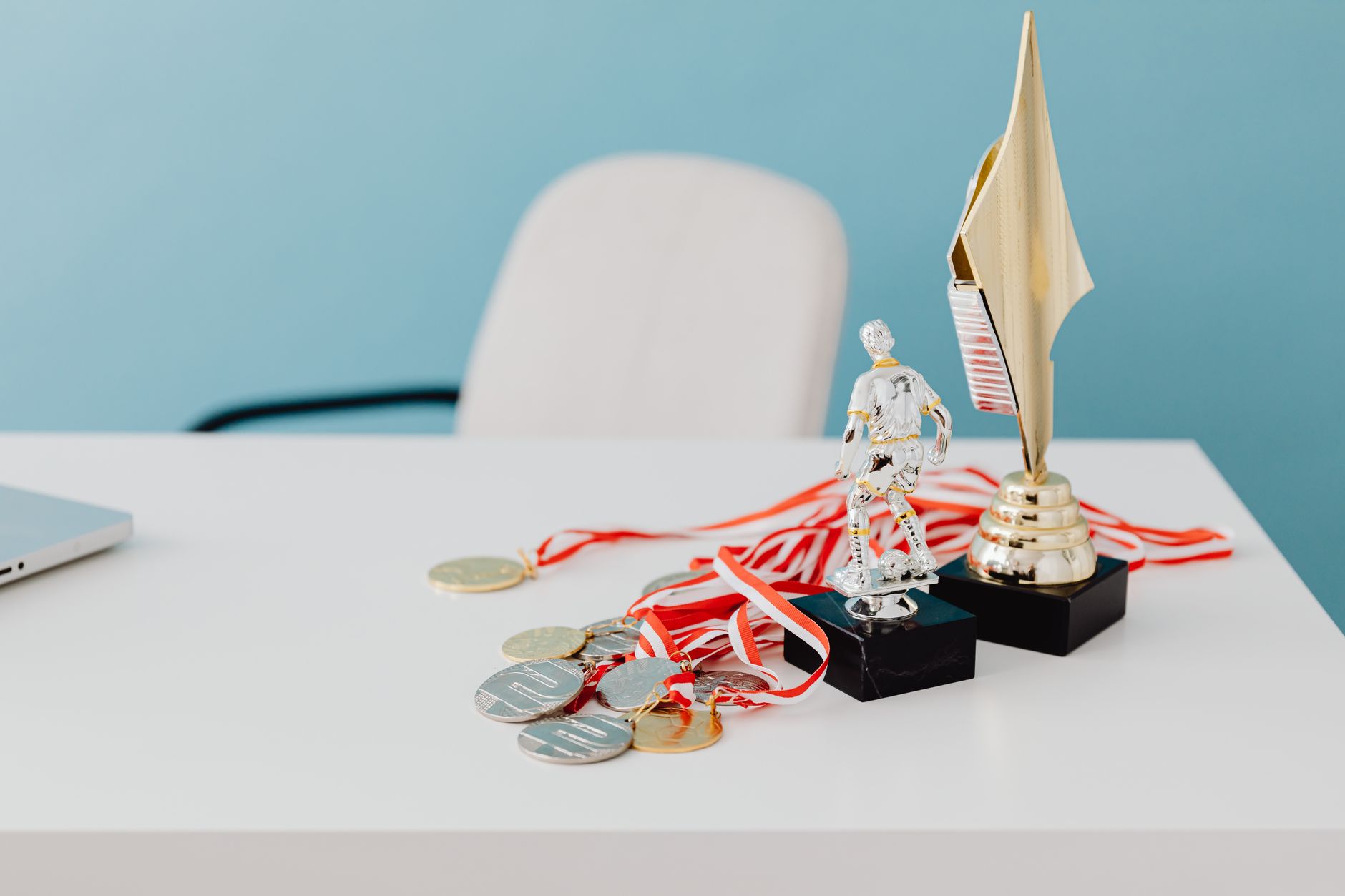 A row of trophies on display, symbolizing achievement and reward systems in gaming