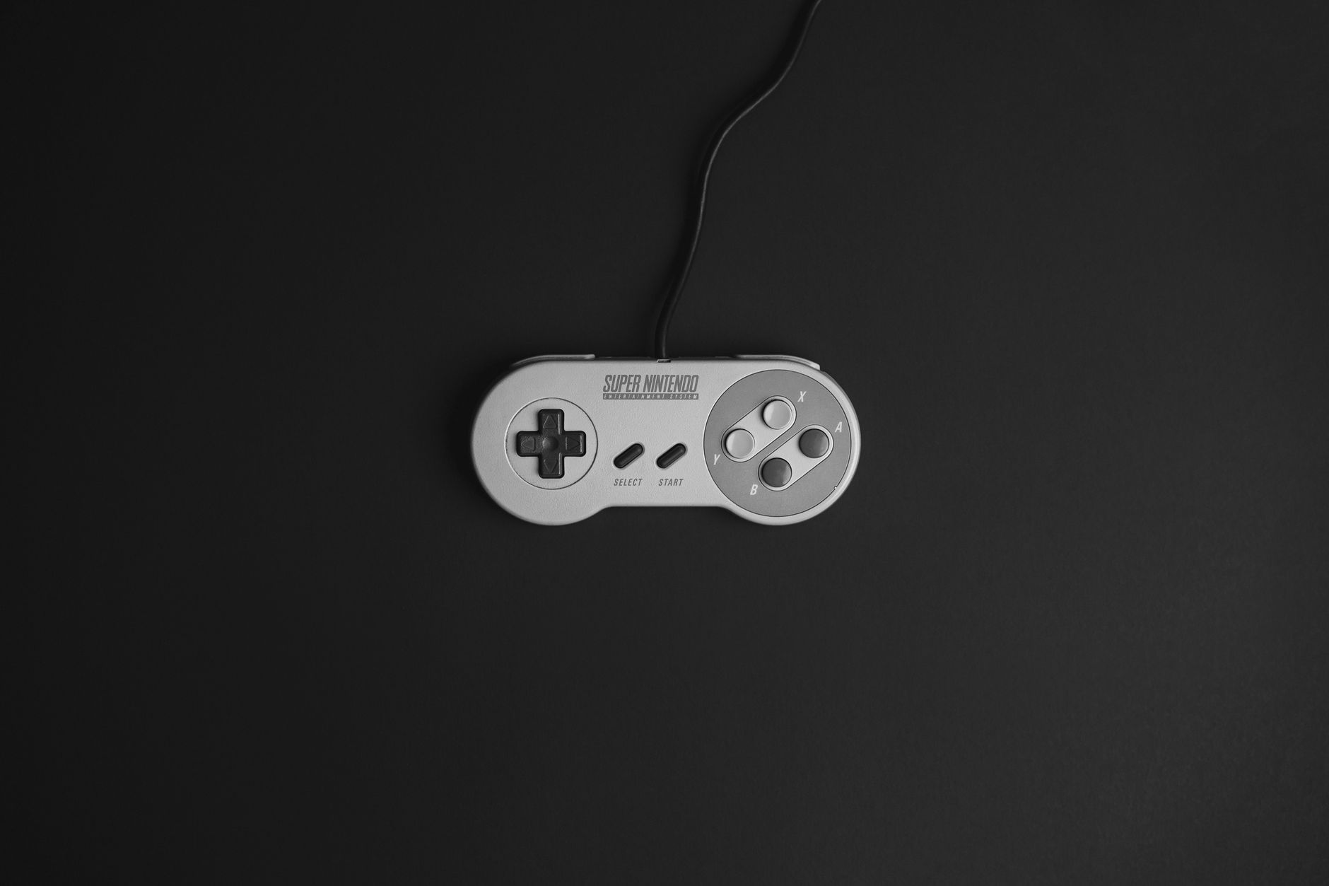Classic video game controllers representing the history of multiplayer gaming