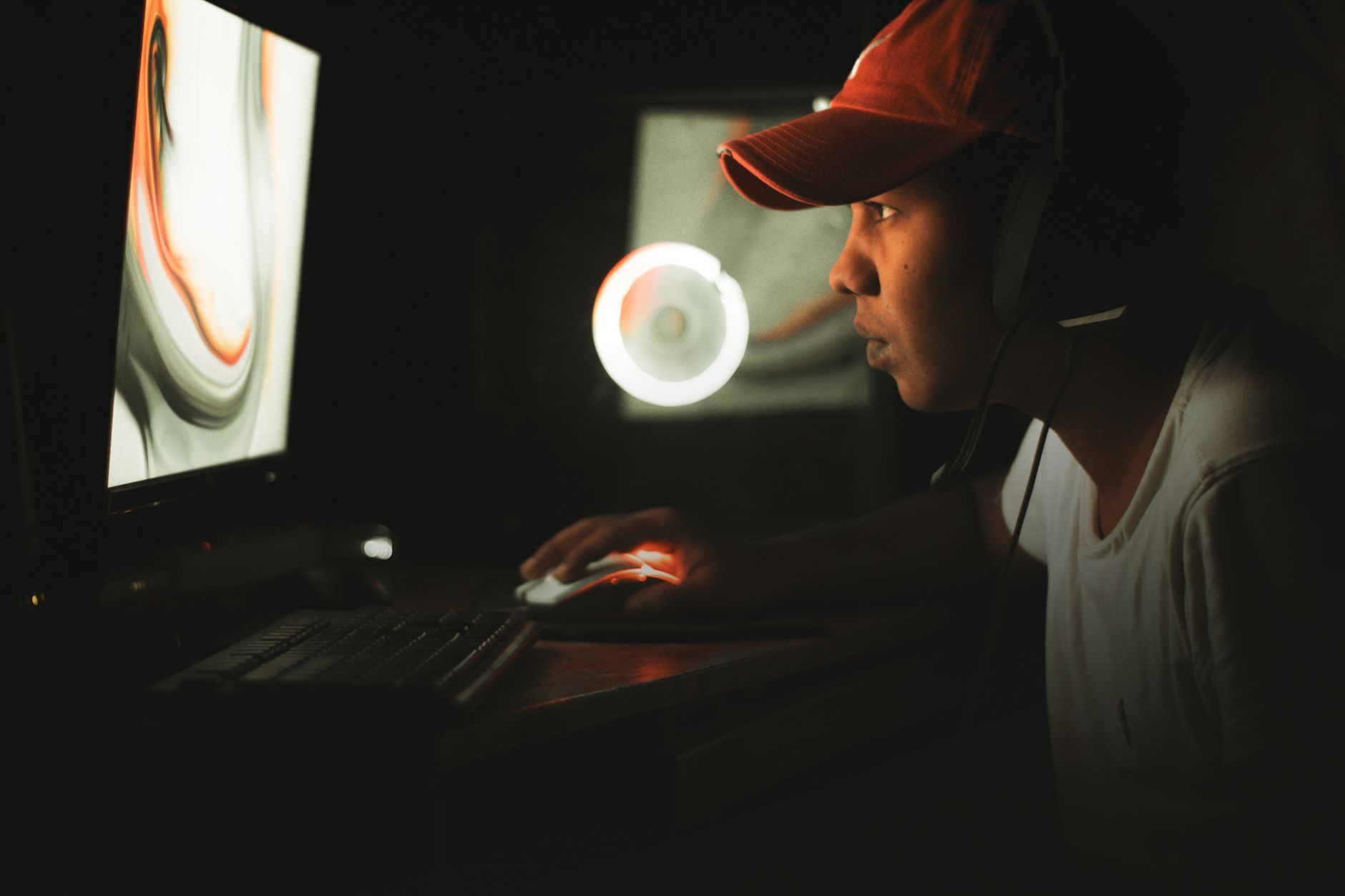 Glowing gaming screen in a dark room representing next-generation game anticipation