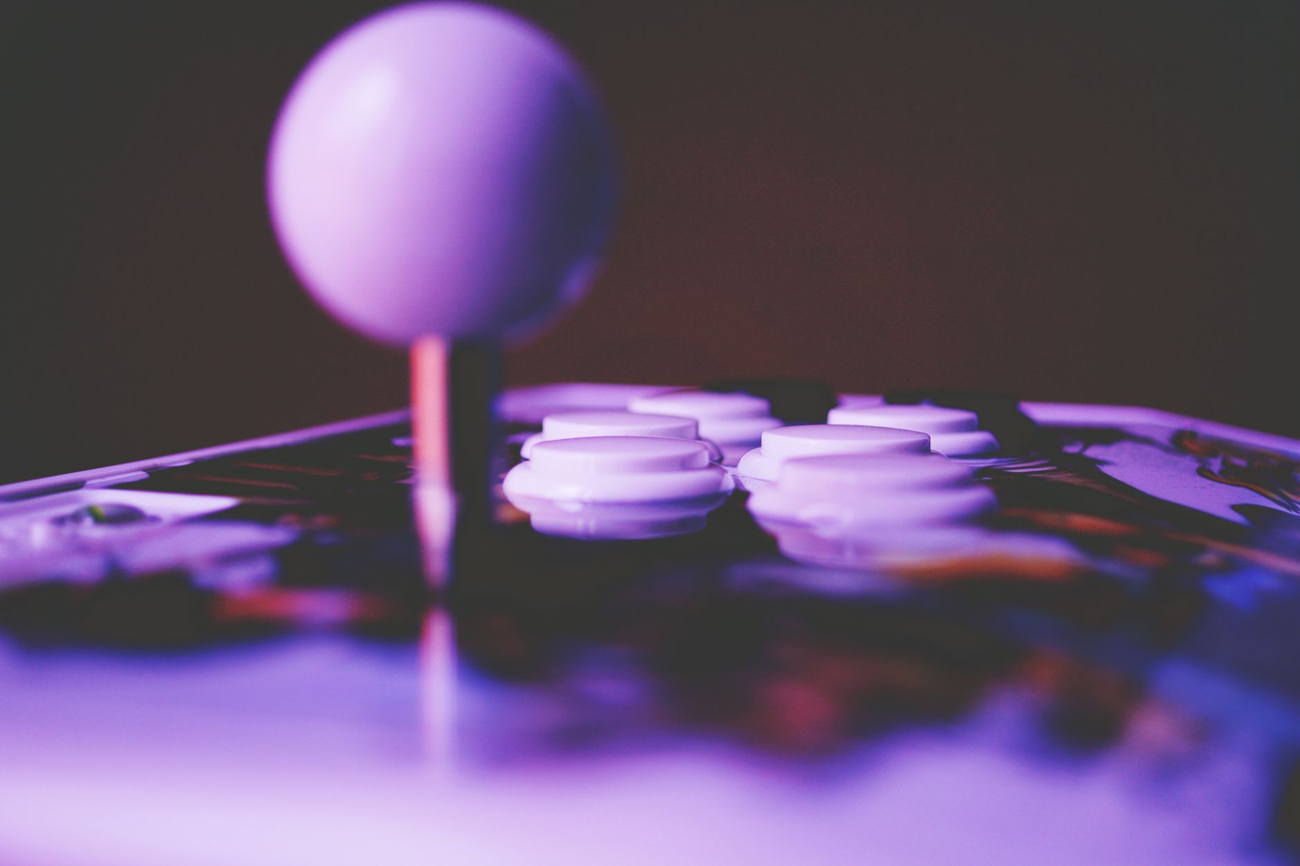 Close-up of a video game controller resting on a surface