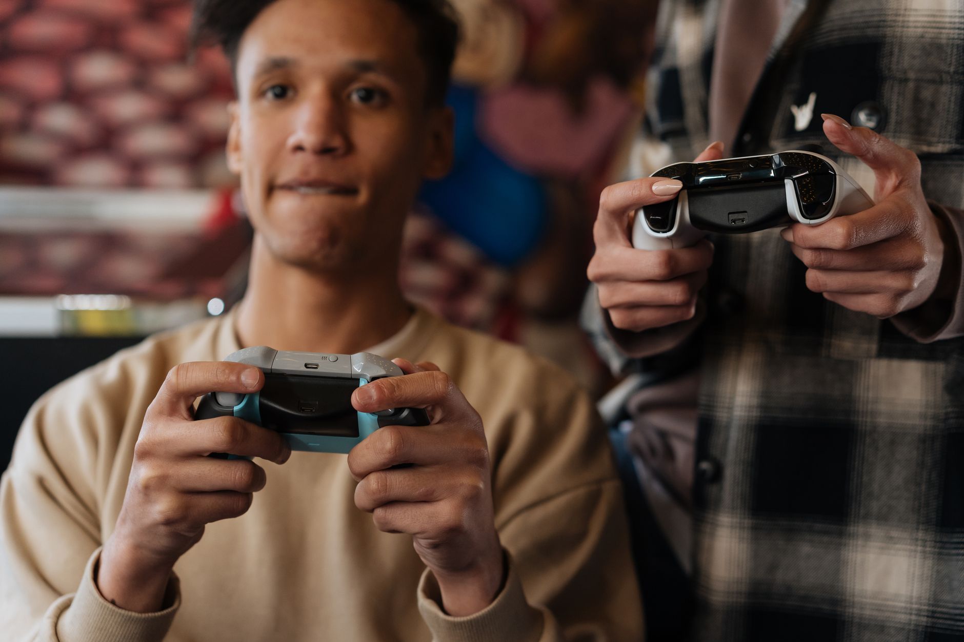 Person holding a gaming controller, representing the frustrated fanbase reaction to Bananza's enemy roster choices