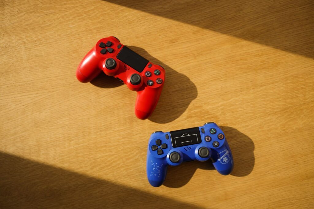 Donkey Kong Bananza’s Absent Balloon Animals Are Quietly Alienating DKCR Fans A game controller resting near tropical foliage, representing the Donkey Kong gaming aesthetic