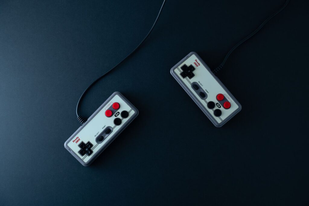 A game controller resting on a surface, representing console gaming