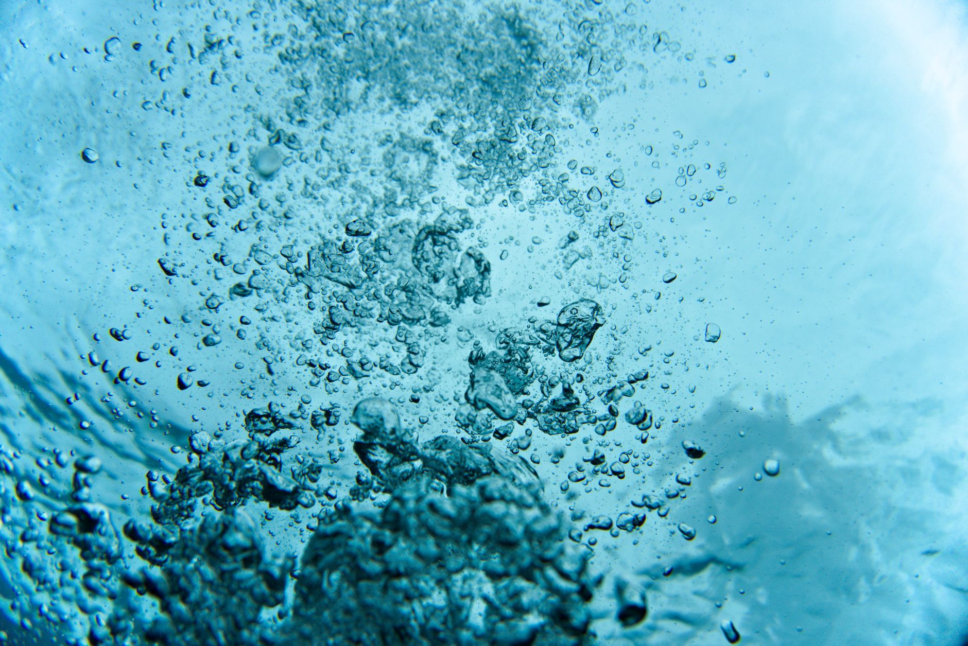 Clear blue underwater scene with light filtering through, evoking aquatic game environments