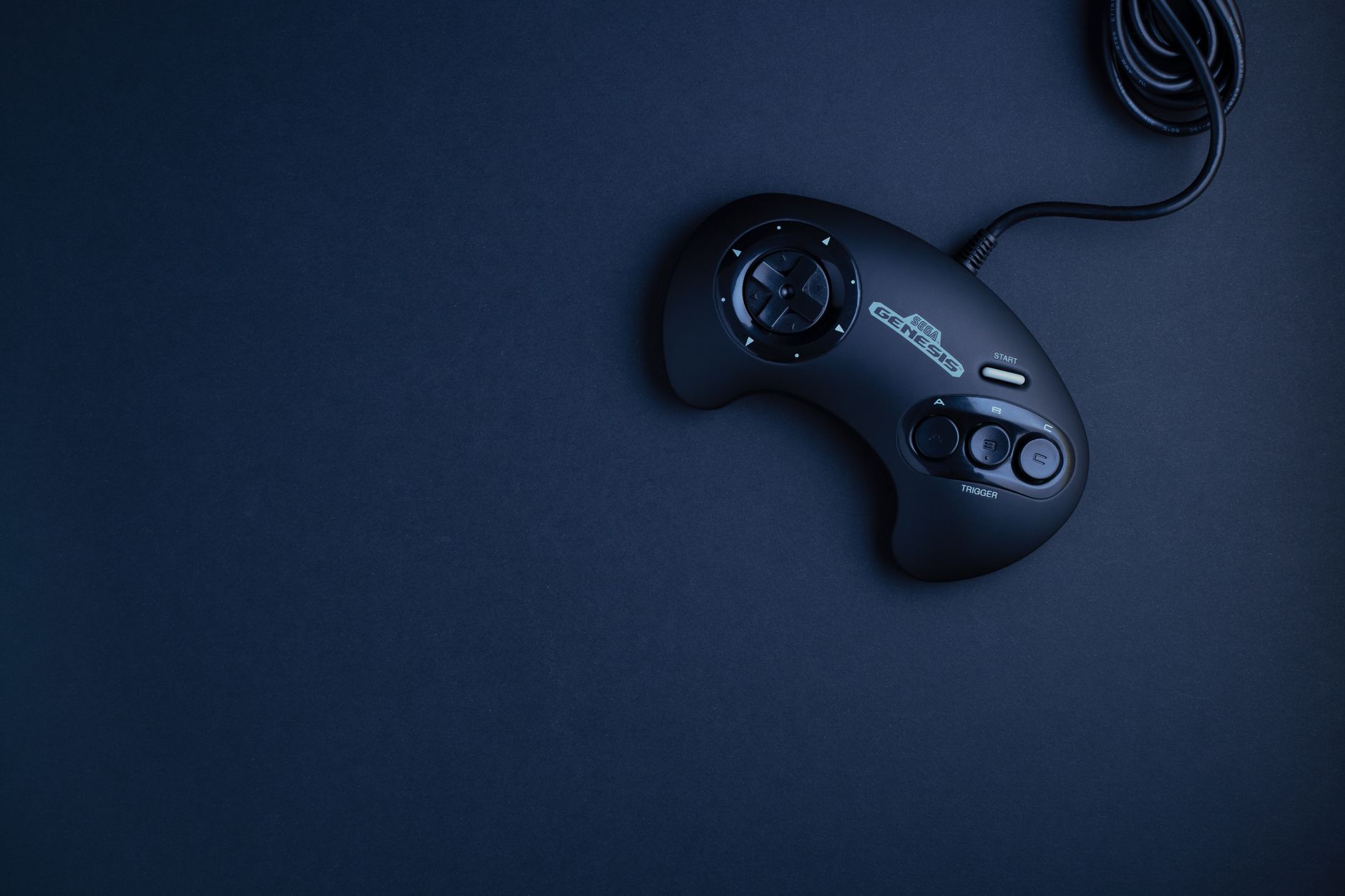 A classic video game controller on a surface, representing nostalgia for retro gaming franchises