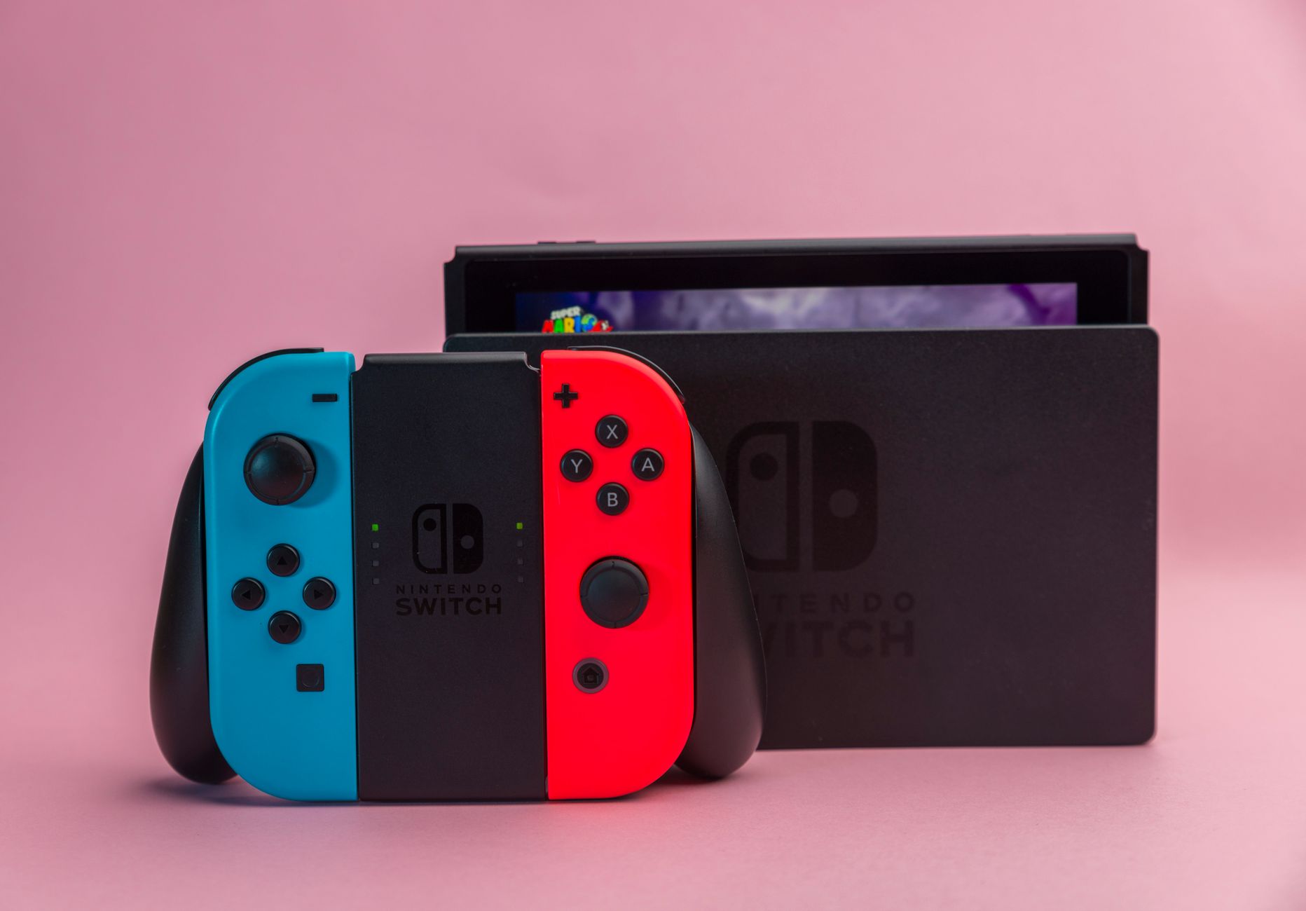 A Nintendo Switch console displayed on a surface, representing modern Nintendo gaming